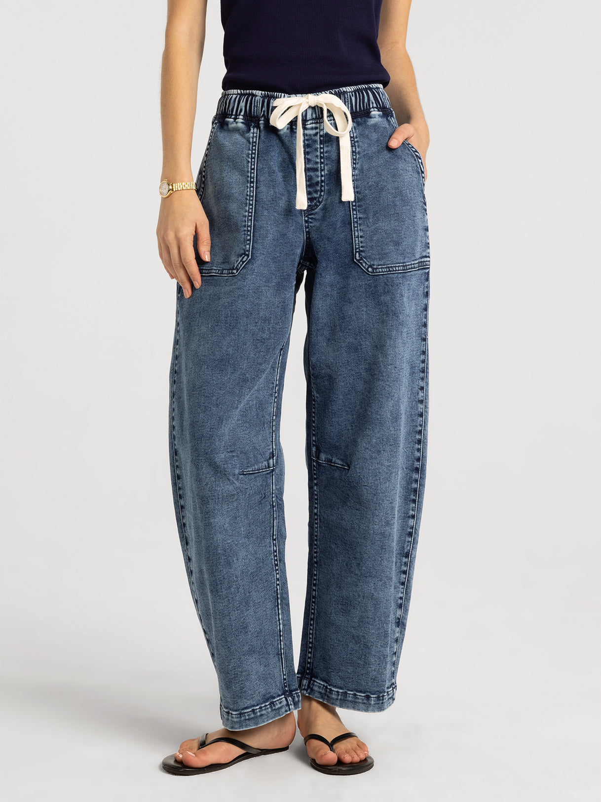Avril Pants in Medium Wash by Thread & Supply